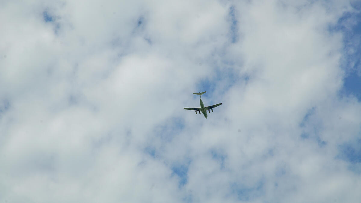 WFP's Ilyushin IL-76 aircraft flying over Nyueny, Upper Nile State to airdrop food.
